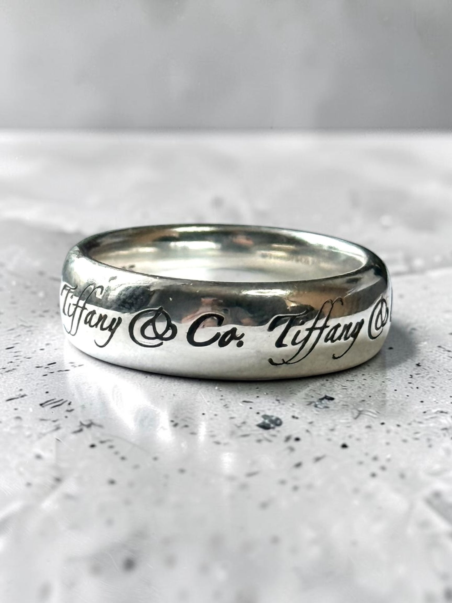 Tiffany & Co. Silver Script Note Tiffany & Co. Ring Band Size L