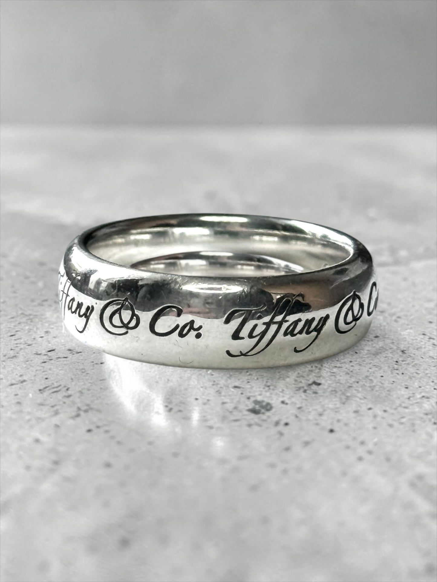 Tiffany & Co. Silver Script Note Tiffany & Co. Ring Band Size L