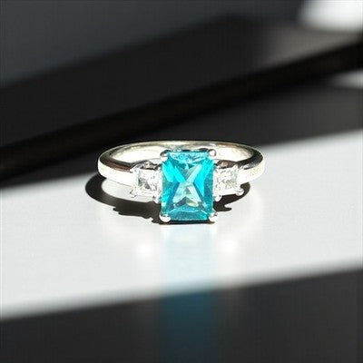 Emerald Cut Blue Topaz Trilogy Ring With White Zircon Accents New Size N 1/2