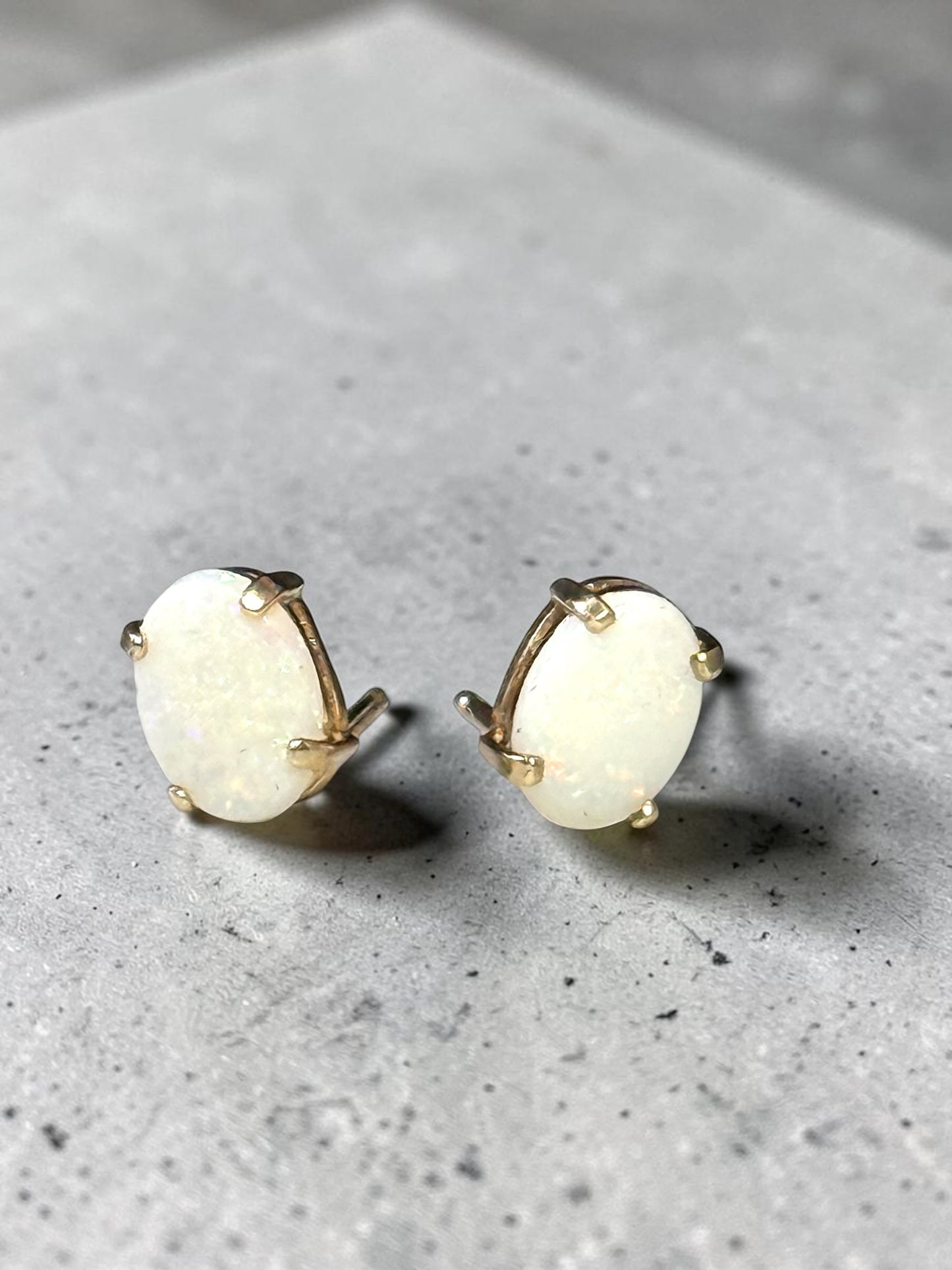 0.86ct Oval Opal 6mm x 4mm Earrings In 10k Yellow Gold