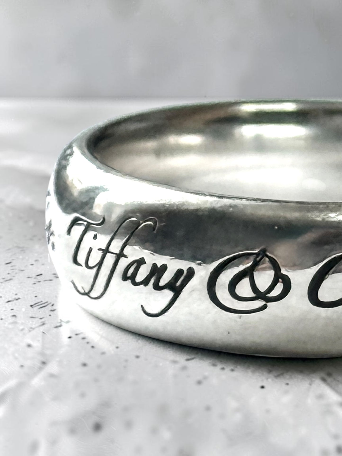 Tiffany & Co. Silver Script Note Tiffany & Co. Ring Band Size L