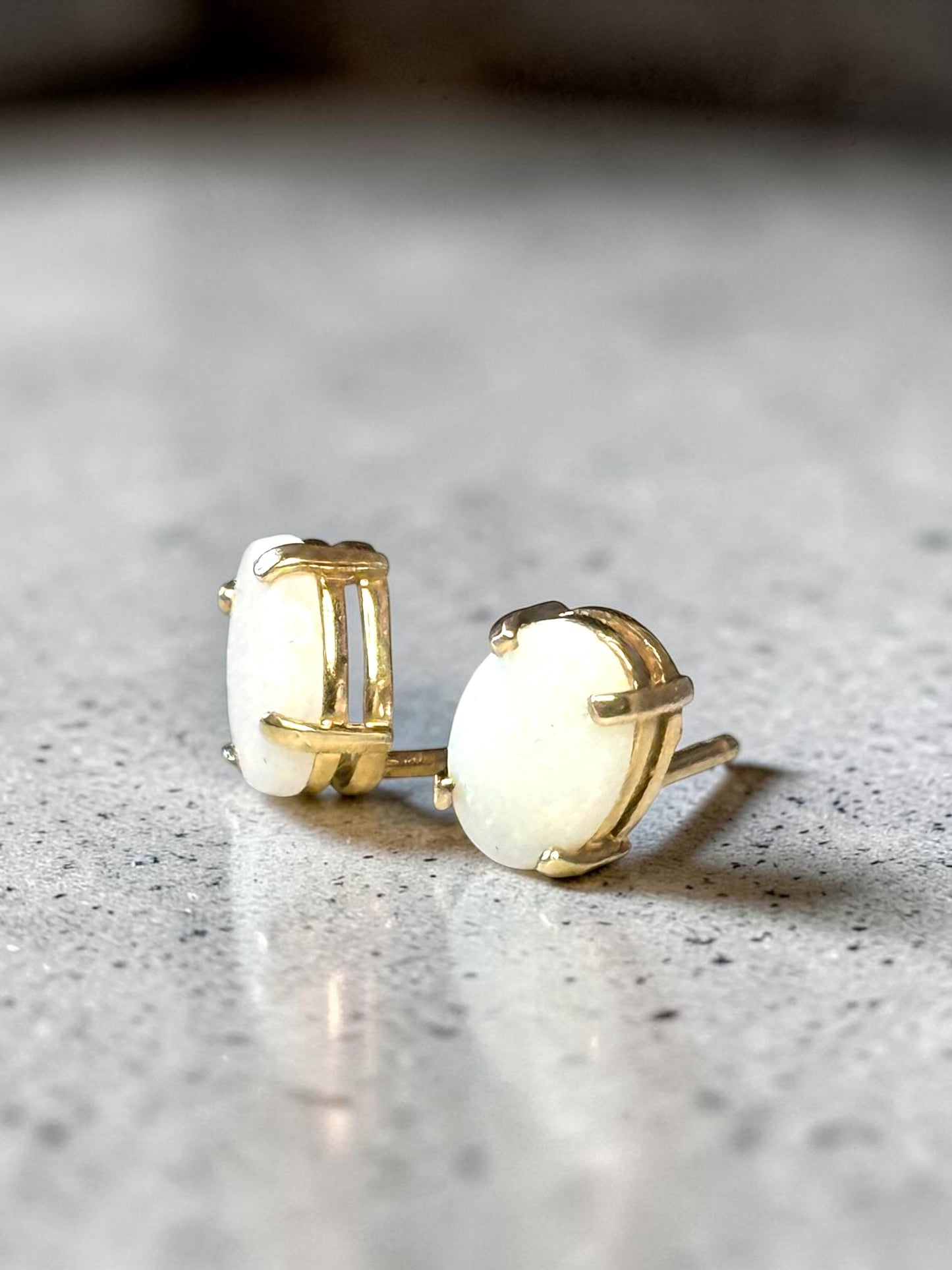 0.86ct Oval Opal 6mm x 4mm Earrings In 10k Yellow Gold