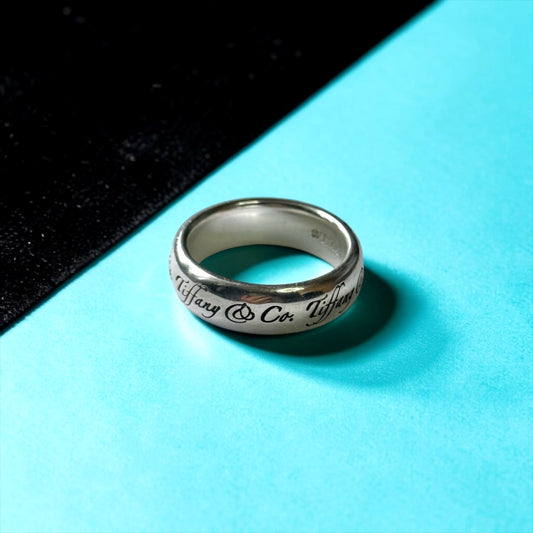 Tiffany & Co. Silver Script Note Tiffany & Co. Ring Band Size L