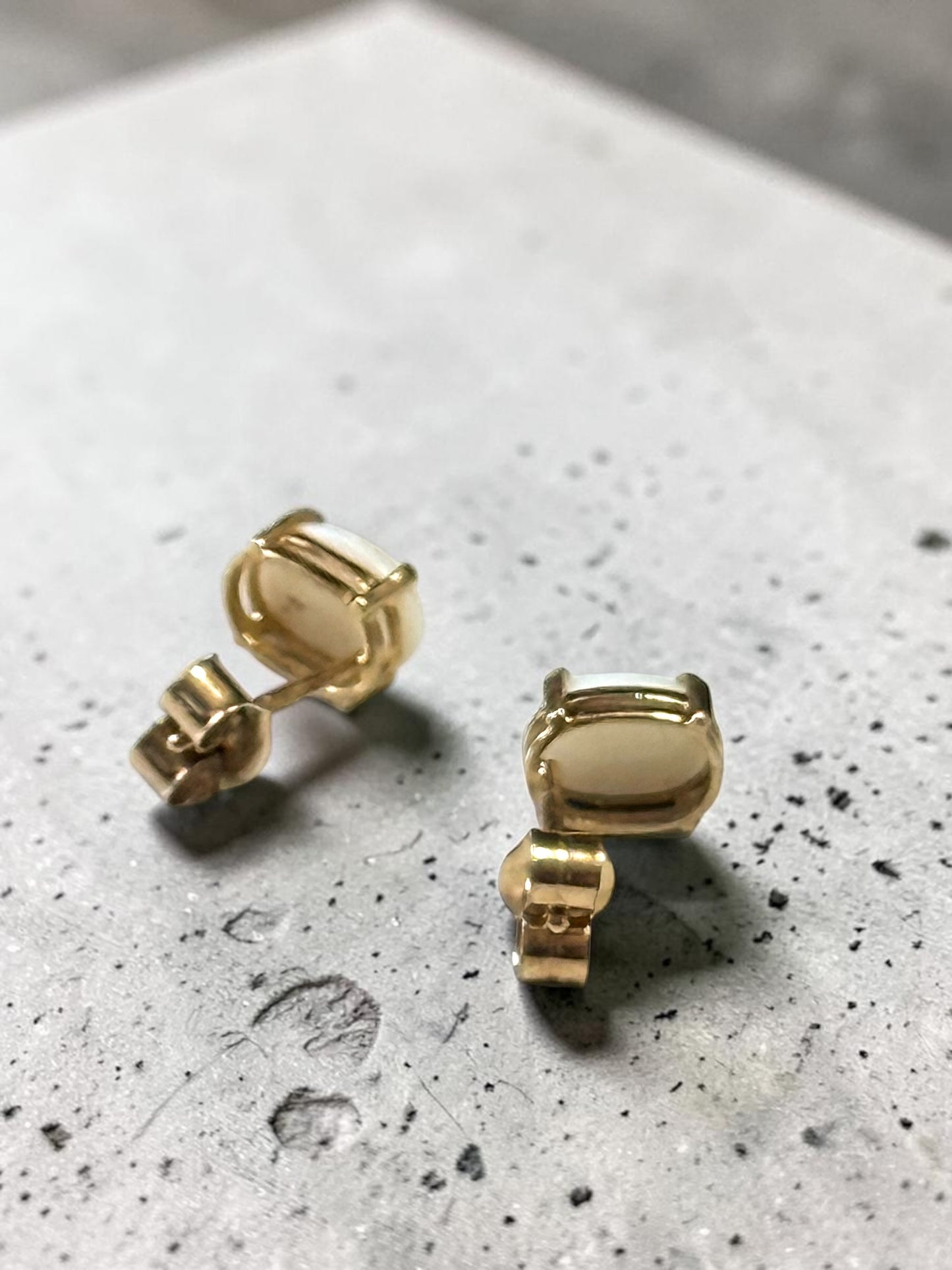0.86ct Oval Opal 6mm x 4mm Earrings In 10k Yellow Gold